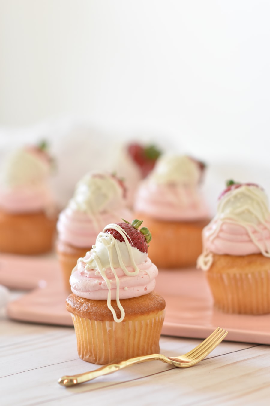 White frosted celebration cake decorated with berries